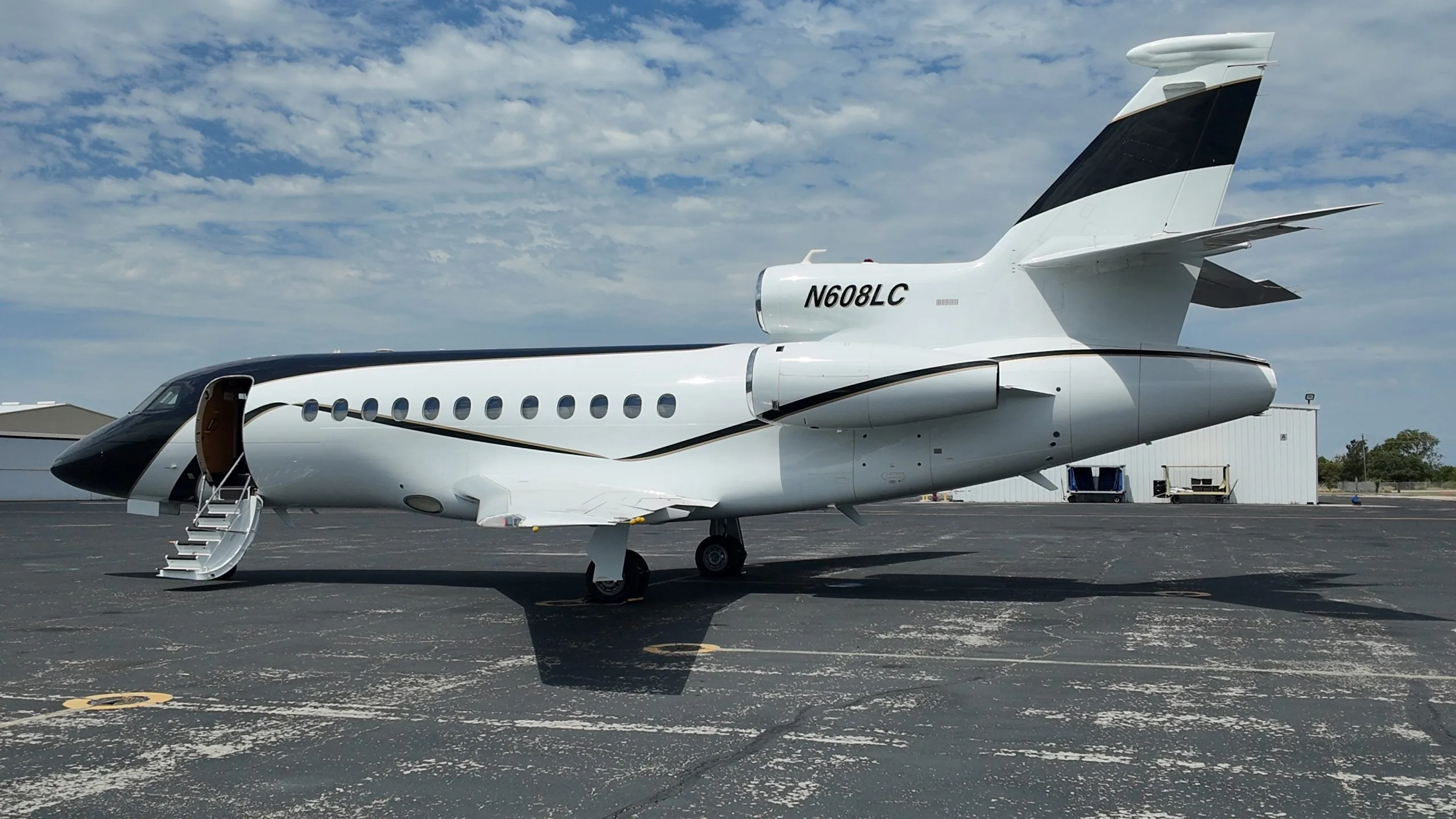 Falcon 900EX N608LC exterior detail showing tail and engines